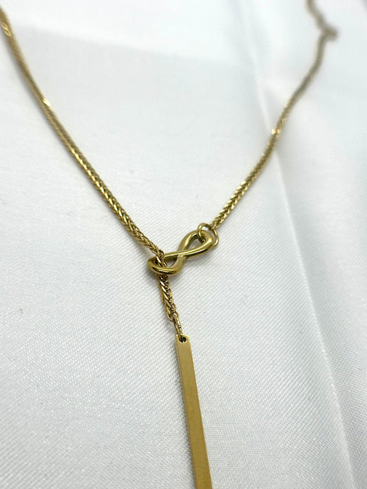 Collier infini barre femme doré, design minimaliste élégant