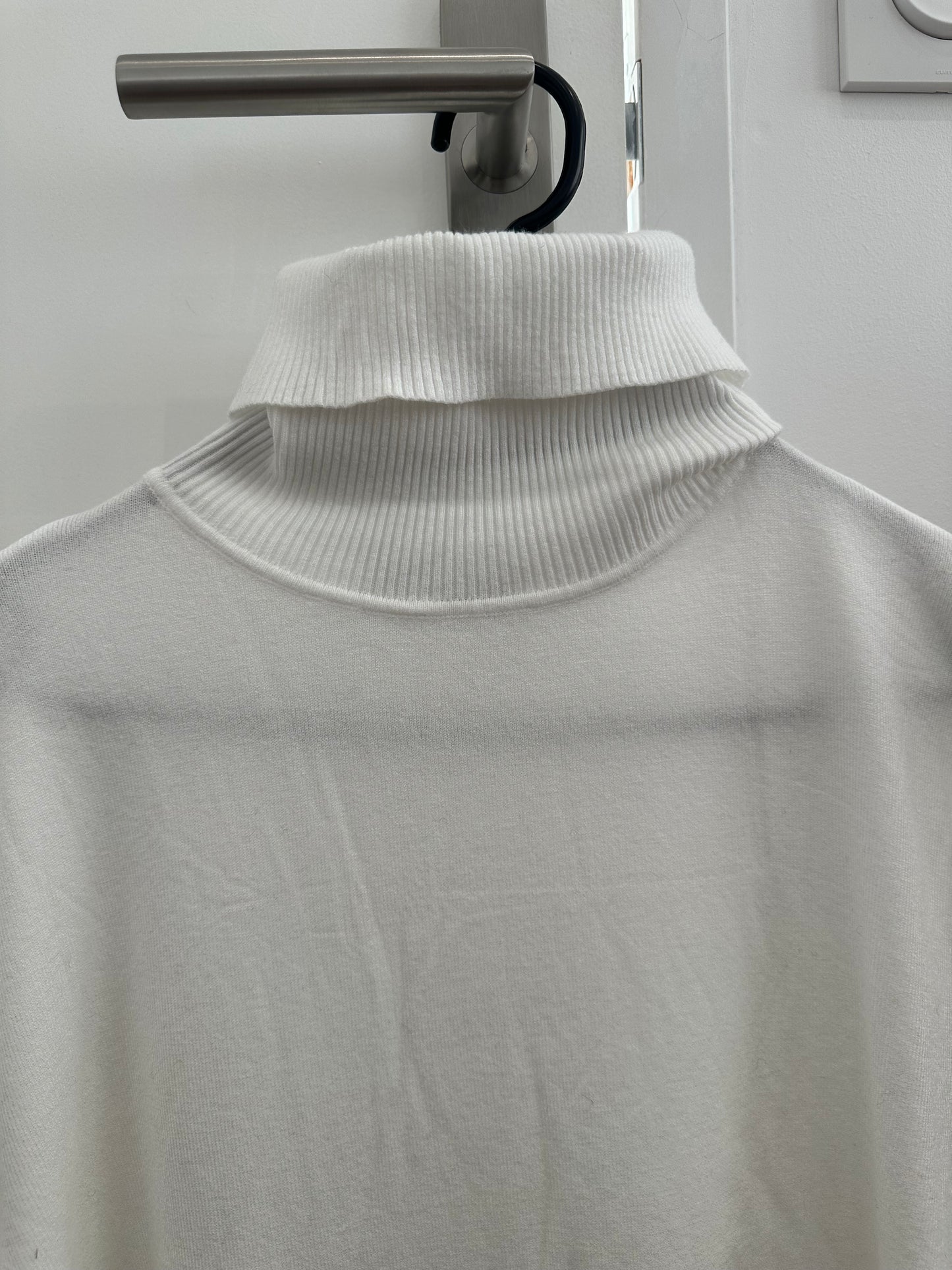 Pull col roulé uni