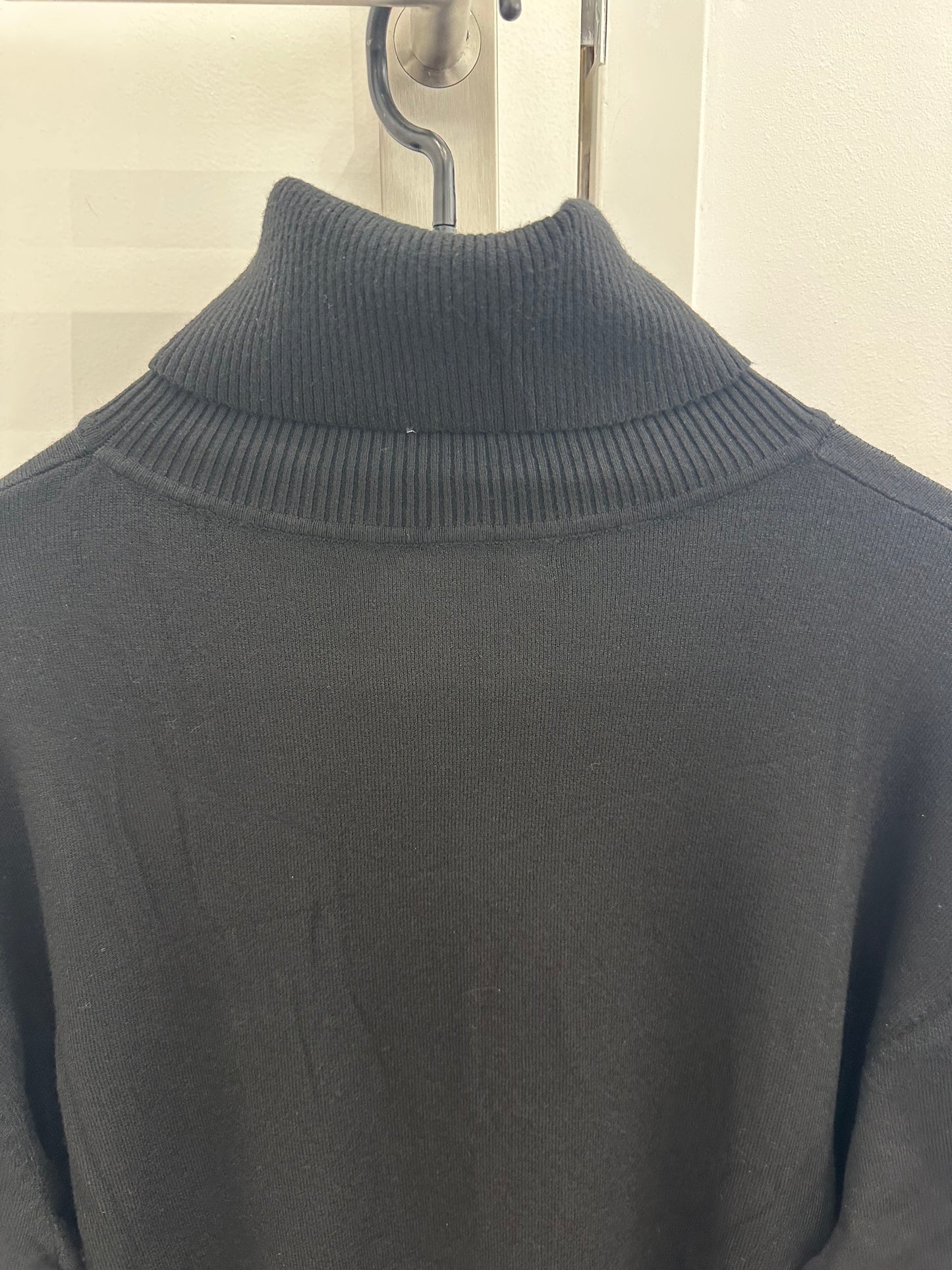 Pull col roulé uni